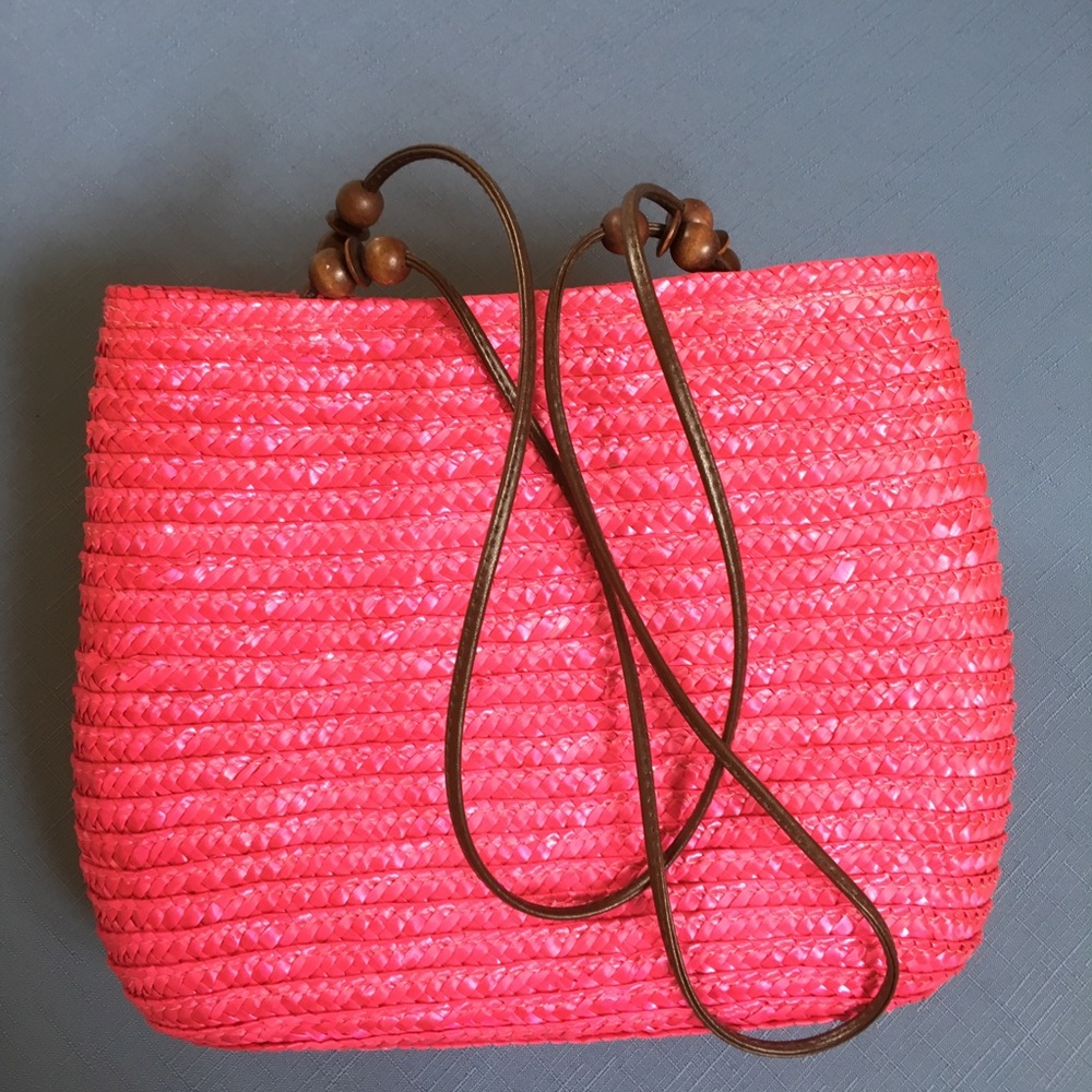Bright fuschia straw purse